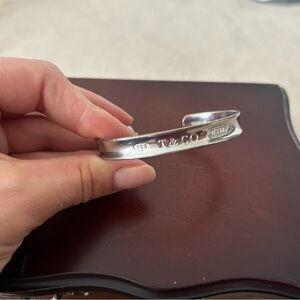 Bangle Style Silver bracelet from “T & Co.”